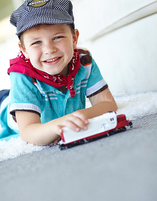 Buy stock photo Portrait, truck or kid with toys playing for learning, development or fun with smile. Driving, boy or happy child enjoying games with plastic vehicle for childhood hobby or growth at house in England