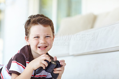 Buy stock photo Home, child and portrait with controller for video game, playful and entertainment for childhood in house. Lounge, happy boy and gamer with equipment for navigation, character action and challenge