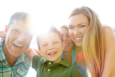 Buy stock photo Portrait, park and parents with kids, hug and bonding together with smile, funny and love. Face, family and mother with father, siblings or children with humor, outdoor and adventure with care or joy