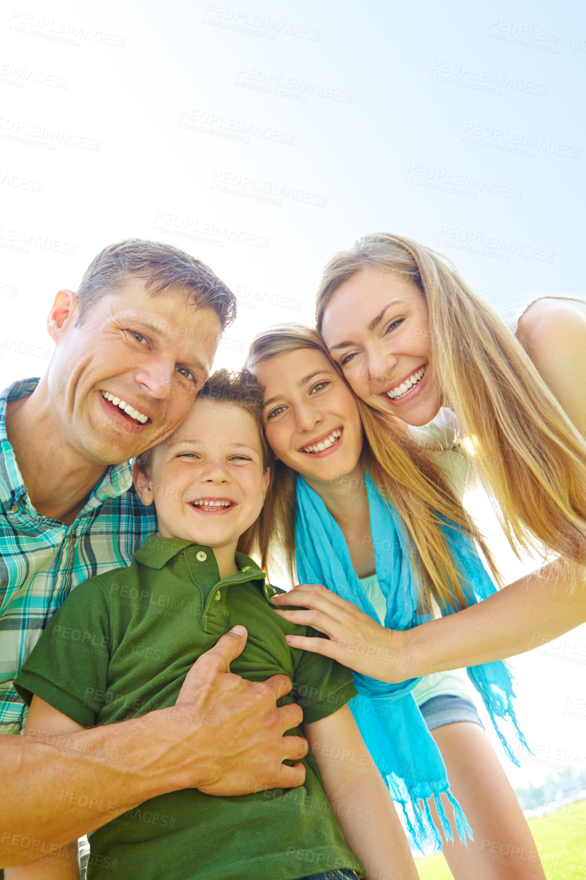 Buy stock photo Portrait, backyard and parents with kids, hug and bonding together with smile, nature and cheerful. Face, family and mother with father, siblings and children in park, break and adventure with love