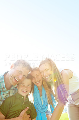 Buy stock photo Happy, children and portrait of parents, nature and bonding in park, smile and hug of family in space. Mockup, mom and dad with kids, relax or outdoor in weekend, woman and man with youth or together