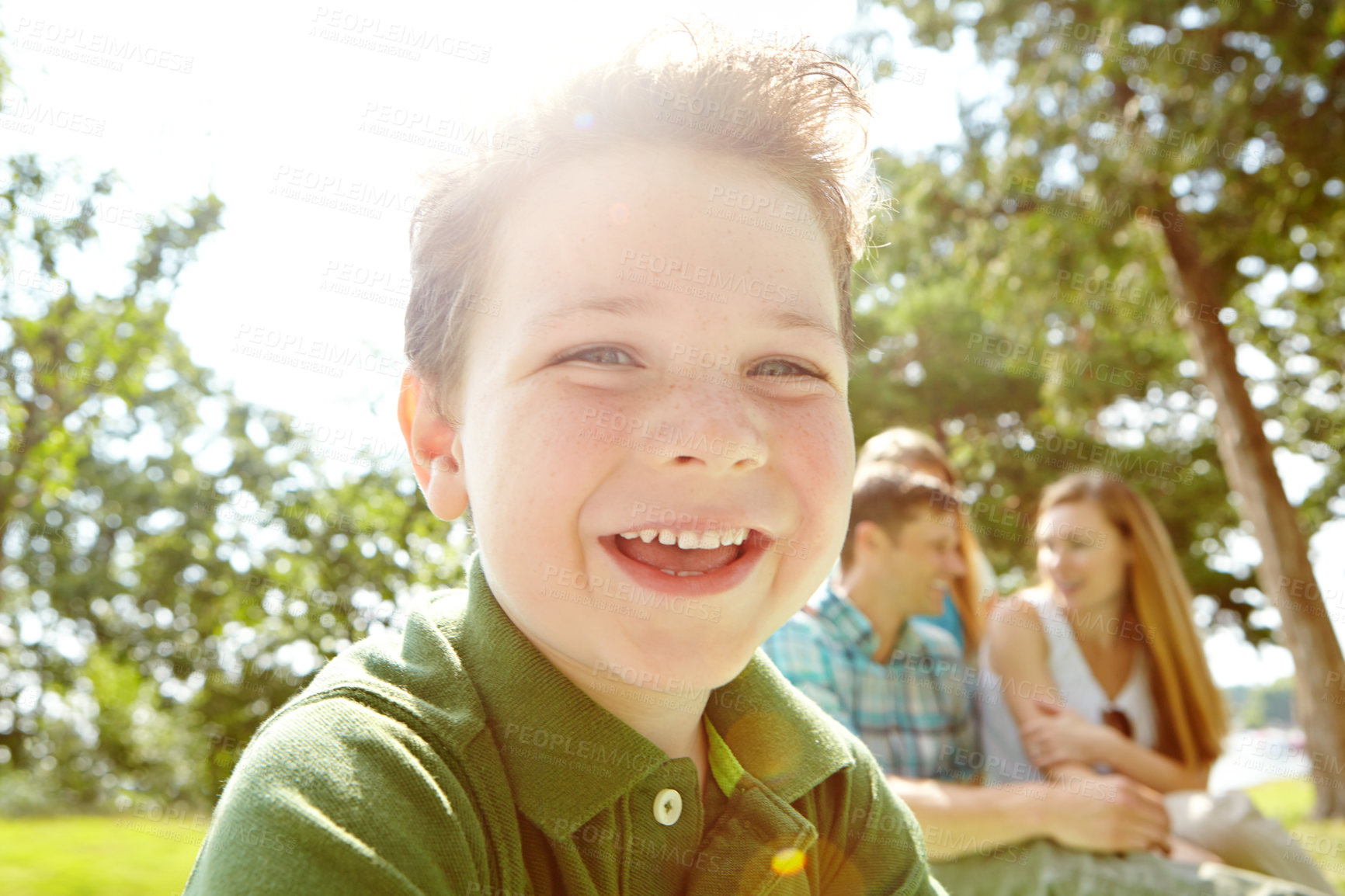 Buy stock photo Portrait, happy child and family in garden on weekend, holiday or vacation in backyard or summer. People, bonding and outdoor with parents, joy and smile as playful for fun, love and support in Spain