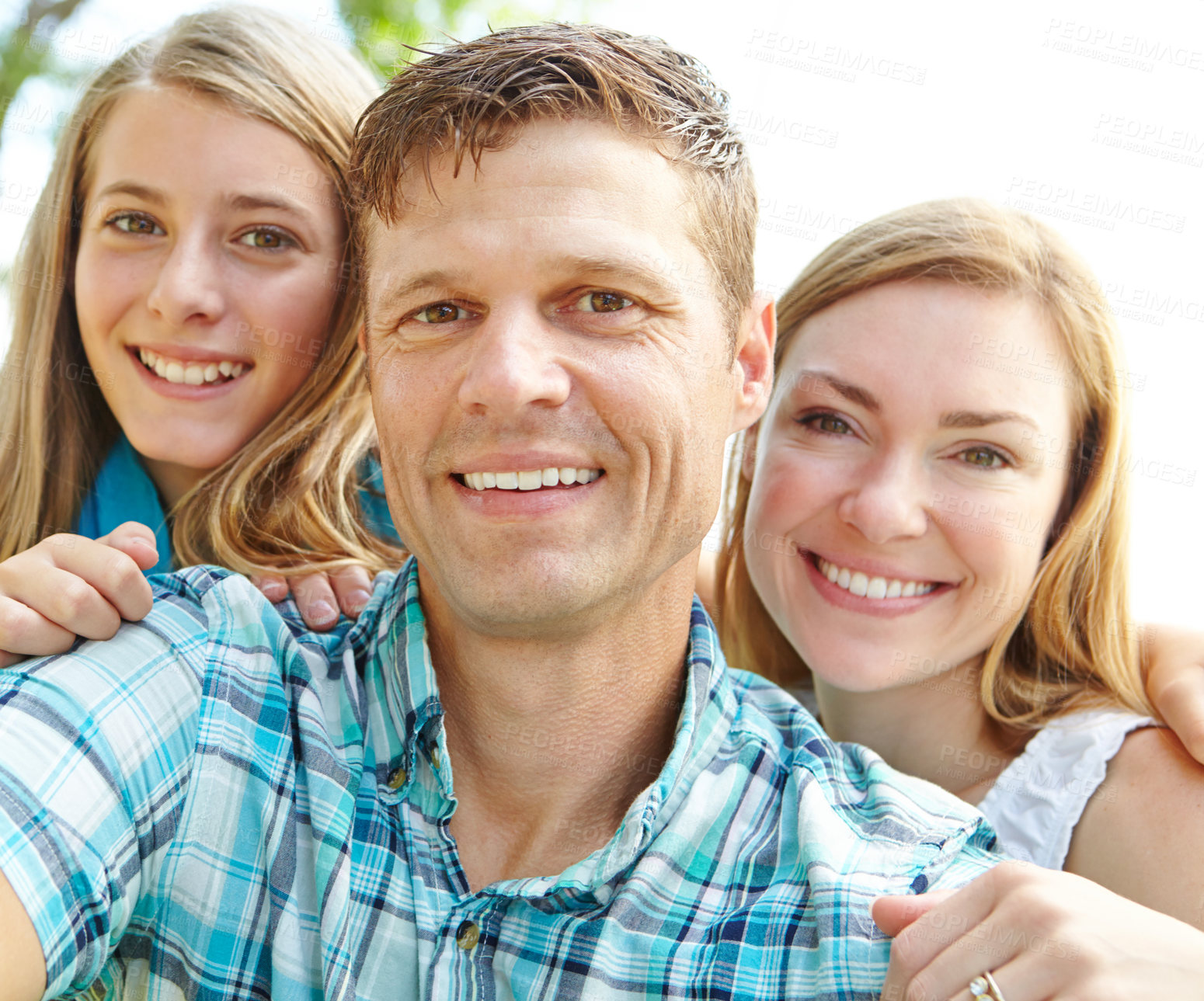 Buy stock photo Portrait, happy family and parents with child outdoor for holiday, vacation or people bonding together. Face, mother and father with teen girl at park for love, support and care for connection in USA