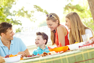 Buy stock photo Children, happy family and parents at picnic with food for party and eating fruits for thanksgiving. Smile, lunch and people together outdoor with mother, father and kids on holiday for celebration