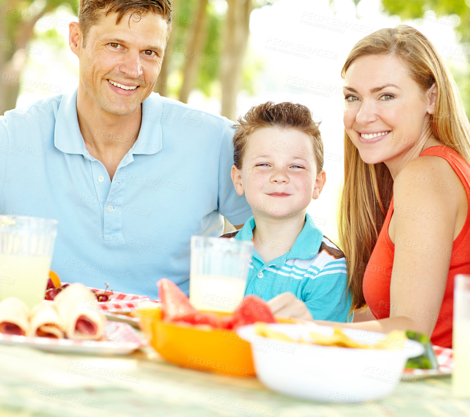 Buy stock photo Kid, happy family and portrait at picnic with food for summer, vacation and thanksgiving with parents. Face, lunch and people outdoor with mother, father and boy on holiday for celebration together