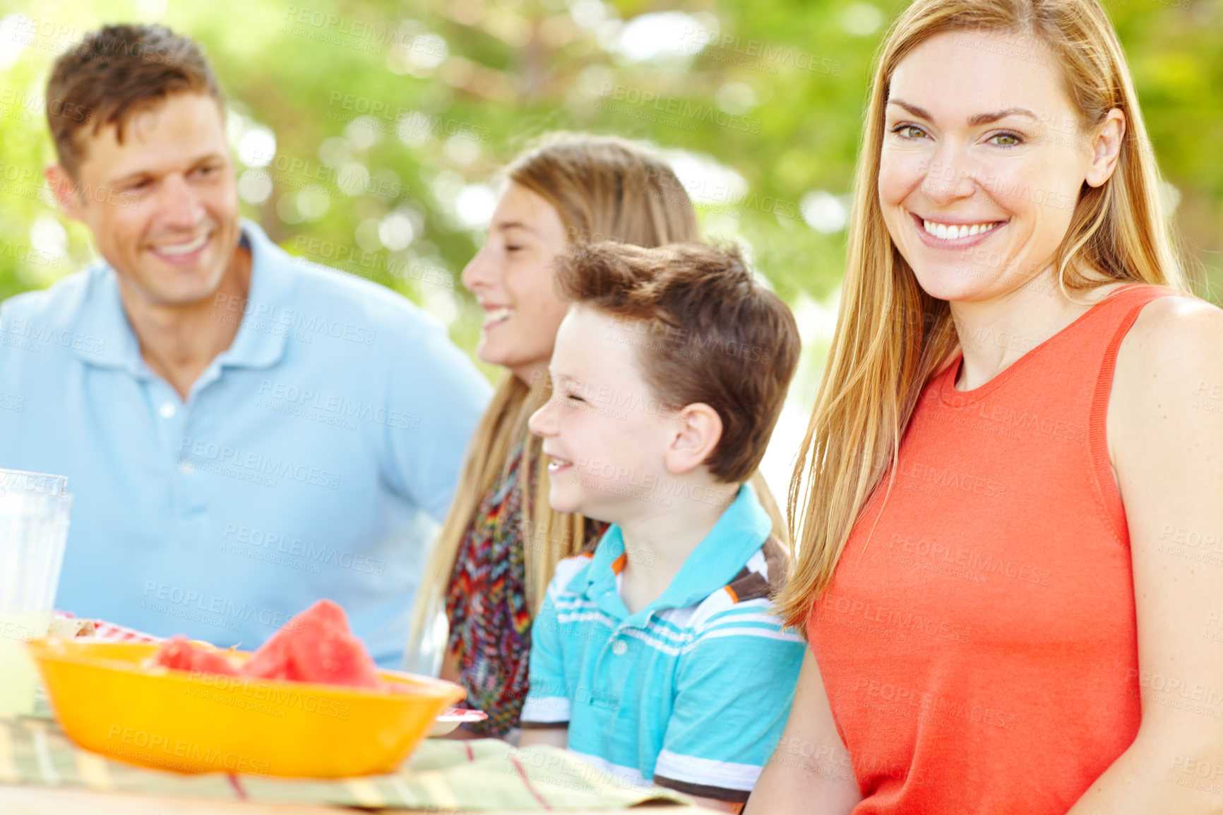 Buy stock photo Portrait, family and bonding with mom, picnic and parents with siblings, nutrition or healthy in nature. Happy, woman and man with kids, vegan and fruit in weekend, fun and break in park and together