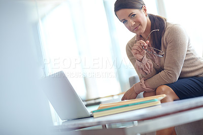 Buy stock photo Glasses, laptop and portrait with business woman on sofa in office for administration or review. Computer, planning and smile with confident employee in professional workplace for online research