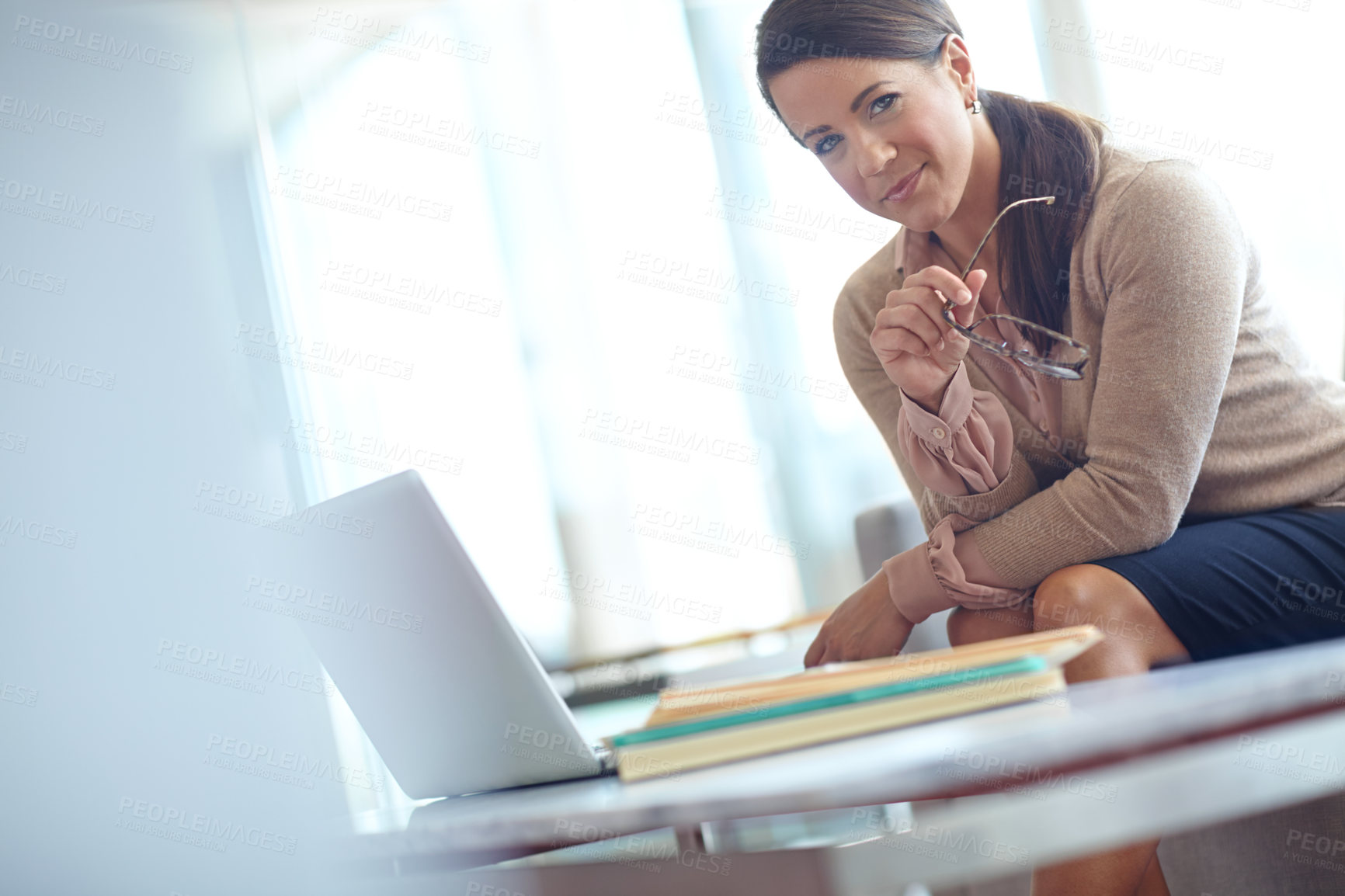 Buy stock photo Glasses, laptop and portrait with business woman on sofa in office for administration or review. Computer, planning and smile with confident employee in professional workplace for online research