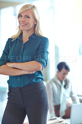 Buy stock photo Portrait of a confident blonde woman standing in an office background