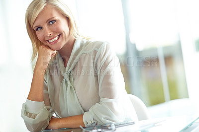 Buy stock photo Portrait of a smiling corporate woman sitting at her desk with copyspace