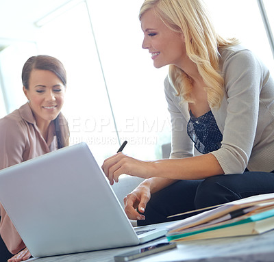 Buy stock photo Women, laptop and reading with smile in office, thinking or teamwork for problem solving at company. Business people, partnership and happy for collaboration, synergy or solution at insurance agency