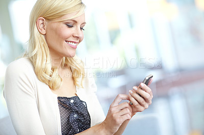 Buy stock photo Business woman, phone and smile for networking, website and online application in office on internet. Employee, smartphone and communication for company project, message or kpi tools app in workplace