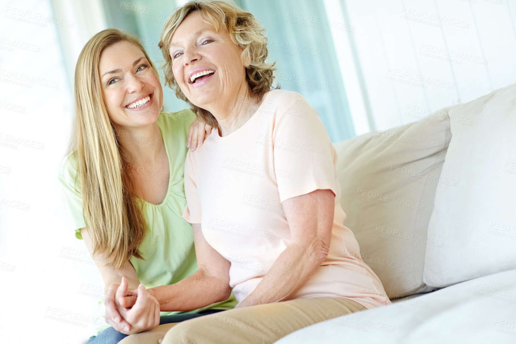 Buy stock photo Sofa, senior mother and woman in portrait with connection, funny memory and bonding together in home. Happy people, mom and adult daughter with love embrace for family, relationship and laughing