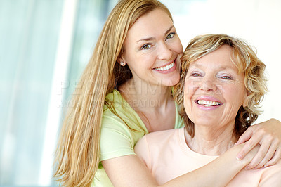 Buy stock photo Home, senior mother and woman in portrait with hug, funny memory and bonding together with smile. Happy people, mom and adult daughter with connection for family, relationship and laughing in house