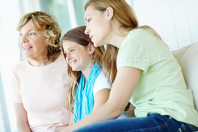 Buy stock photo Happy family, grandmother and bonding with kid, trust and relax on holiday or vacation for break. Senior woman, mother and child in lounge together for love, support and care as generations in house