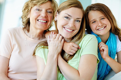 Buy stock photo Hug, happy kid and mom with grandmother in portrait for family generations, love and bonding together. Face, grandparent and girl embrace mother for support, care and smile with women at home in UK