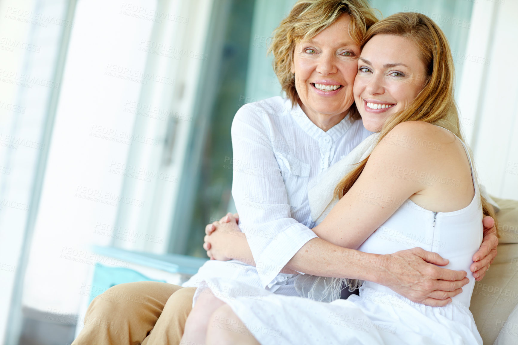 Buy stock photo Portrait, mature mother and daughter embrace on sofa with confidence, smile and bonding in living room together. Relax, senior mom and girl with happy hug for love, care and support in family home