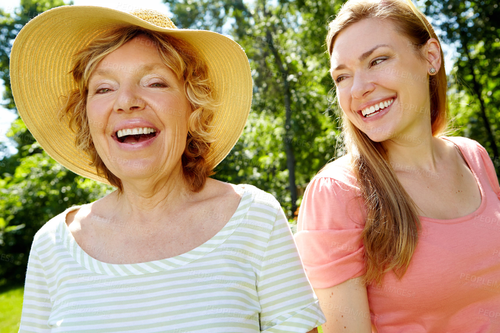 Buy stock photo Garden, senior mother and daughter with happiness for love, support and relax in Germany. People, parent and smile outdoor in park for summer holiday, break and nature for bonding and respect