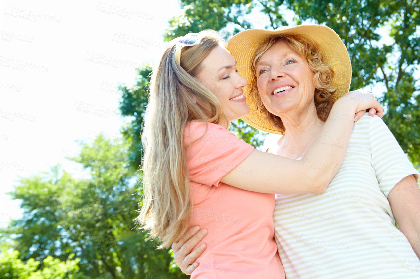 Buy stock photo Garden, senior mother and daughter with smile for love, support and relax in Germany. People, parent and happiness outdoor in park with sky for holiday, break and nature for bonding and respect