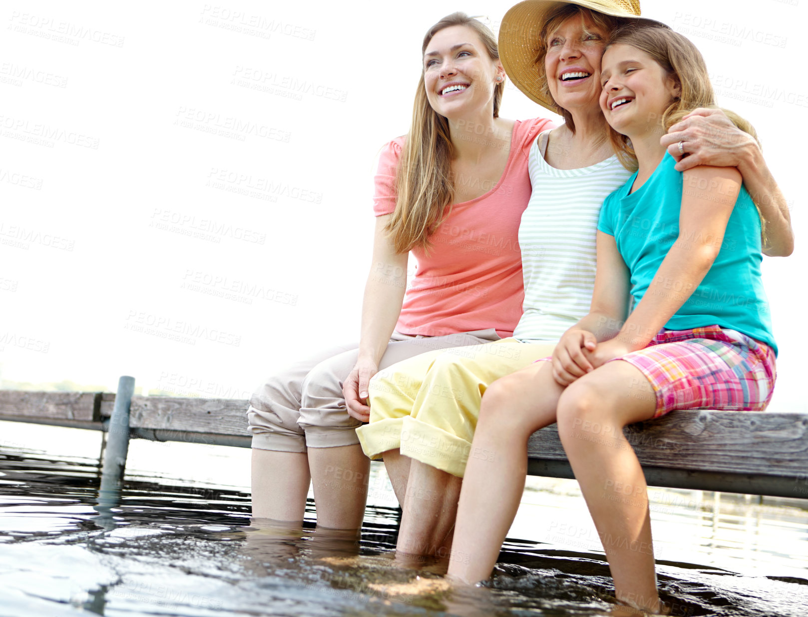 Buy stock photo Happy family, mother and child with lake, embrace or jetty on holiday or vacation as barefoot. Grandmother, woman and girl for hug or bonding together with love, support and care as generation in USA