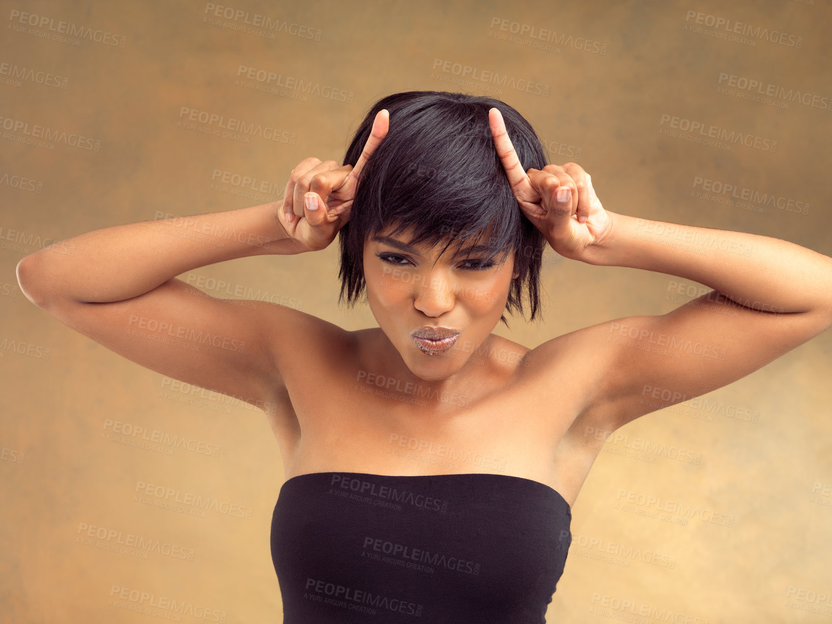 Buy stock photo Portrait, horns and fingers for black woman, studio and expression for comedy on background. Punk, smile and face of female model, funny and beauty for makeup and cosmetic with devil gesture
