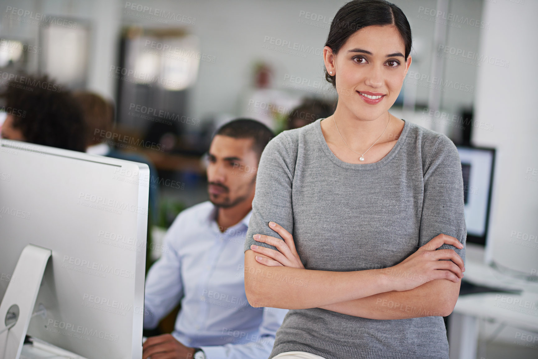 Buy stock photo Woman, desk and arms with colleague or computer for work, technology in workplace for brand. Female employee and confidence with smile in office for job, content creator or web designer and happy