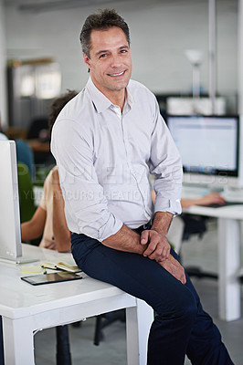 Buy stock photo Businessman, smile and portrait on desk in office with tablet, colleagues and workplace. Project, manager and male person in company for work, career and corporate with technology and notebook