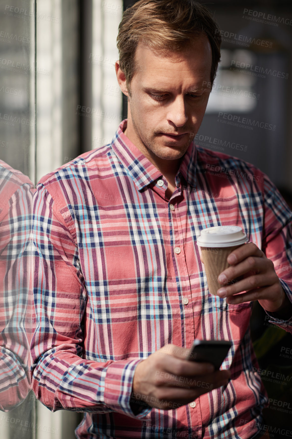 Buy stock photo Business man, coffee and smartphone in office for networking, web review or internet app in creative agency. Professional, technology and male worker with caffeine for text, typing or reading email