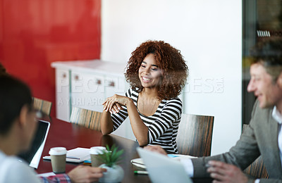 Buy stock photo Woman, discussion and desk for meeting in conference room with teamwork, laptop and creative career. Designer, talking and tech in boardroom with startup agency for clients, collaboration and smile