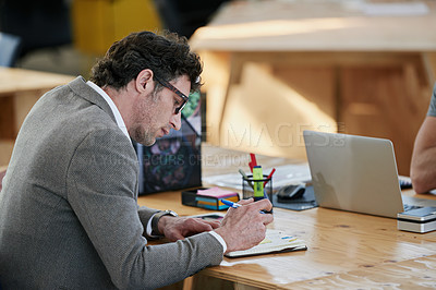 Buy stock photo Businessman, notebook and brainstorming at desk for project, planning and teamwork in office. Mature male person, collaboration and research in workplace for start up company and global enterprise 