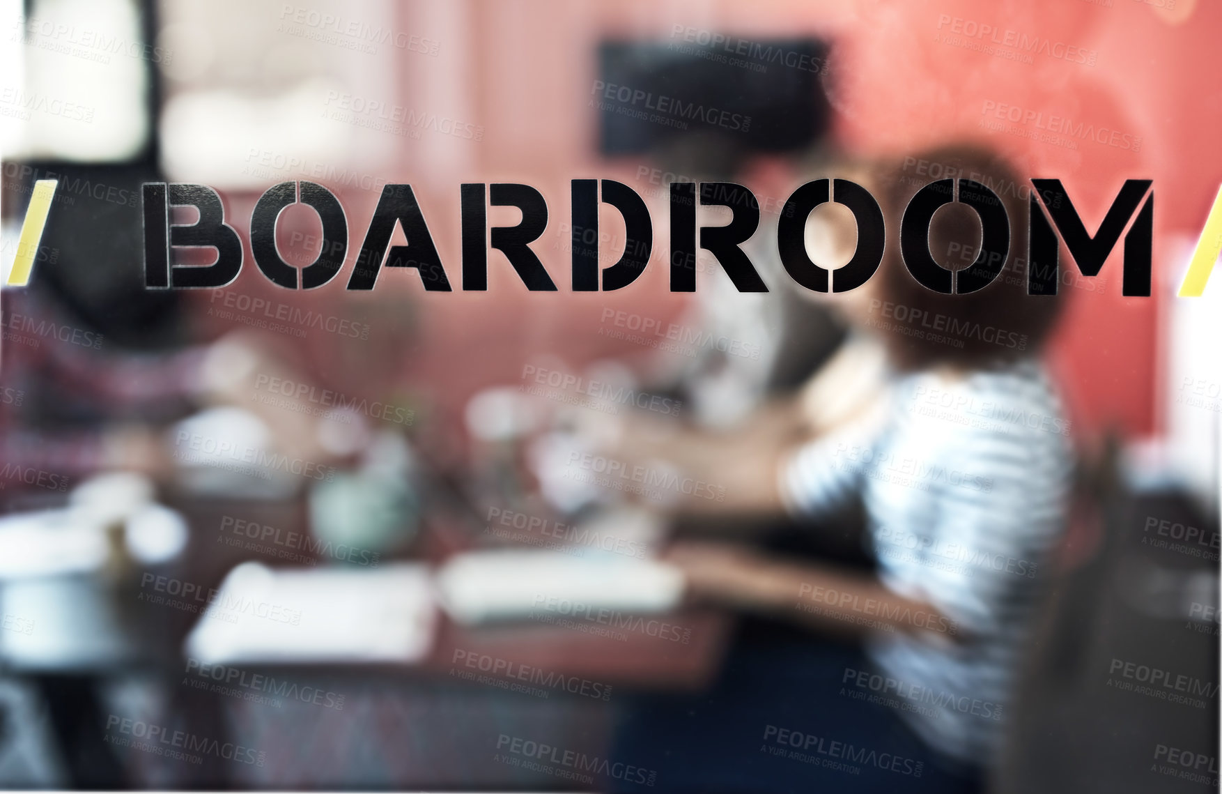 Buy stock photo Closeup shot of a sign on a boardroom window with businesspeople blurred in the background