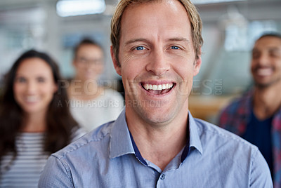 Buy stock photo Closeup cropped portrait of a smiling man with people in the background