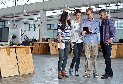 Buy stock photo Full length shot of a group of casual businesspeople in the office