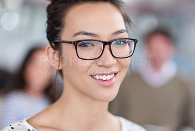 Buy stock photo Cropped portrait of a beautiful young woman smiling at the camera