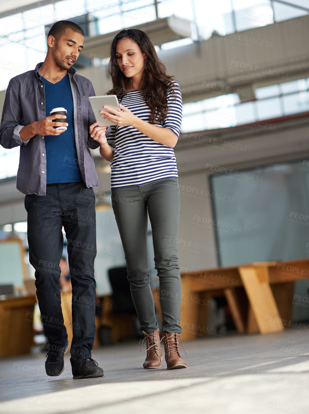 Buy stock photo Break, teamwork and business people with tablet in office with smile, reading email and info for startup project. Collaboration, man and woman for creative company with tech, web search or connection