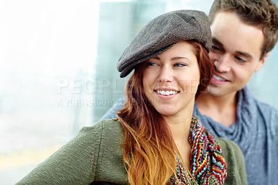 Buy stock photo A couple sitting at a train station with copyspace