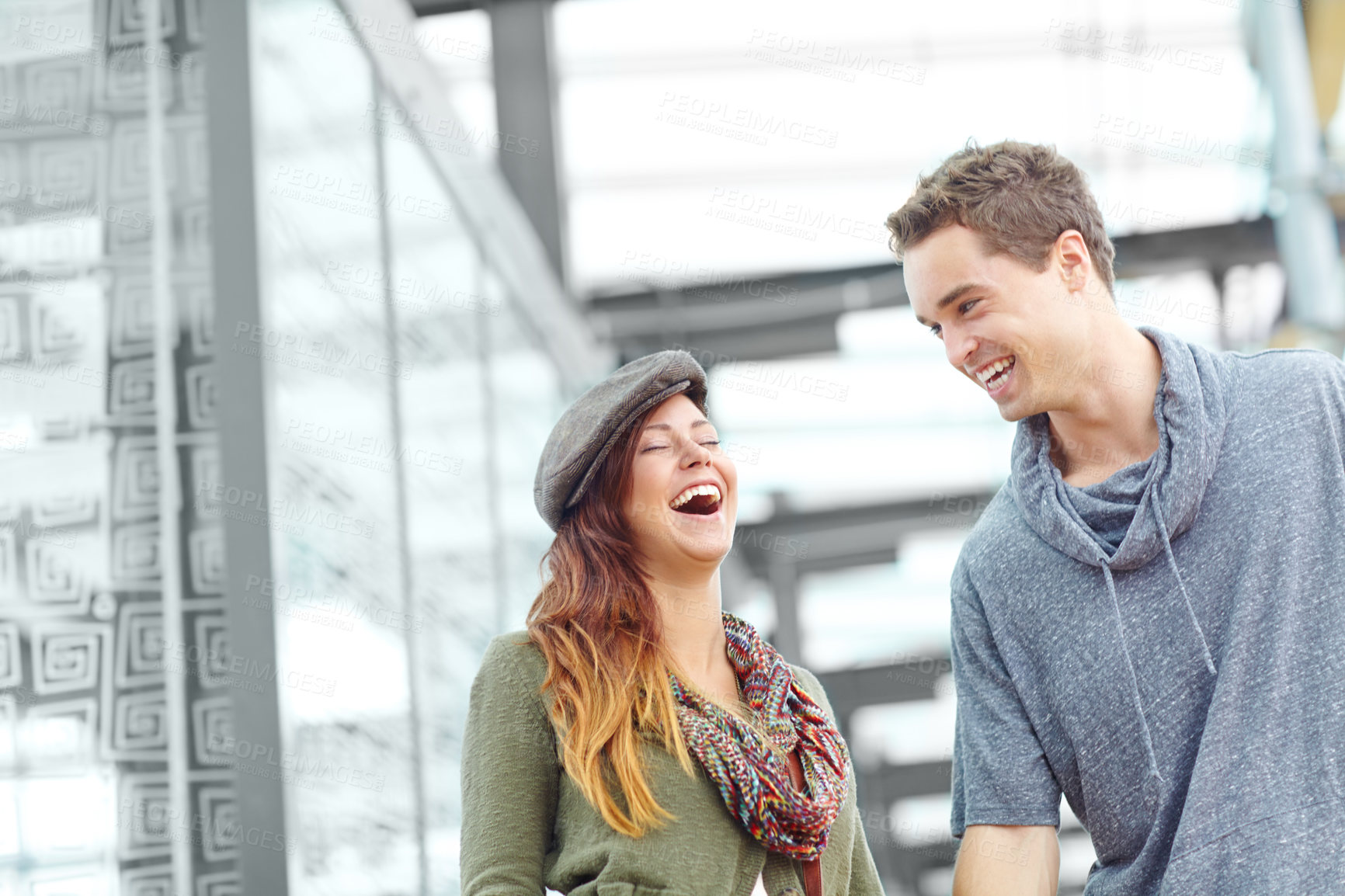 Buy stock photo Couple, commute and laughing in train station for holiday, vacation or London honeymoon journey. Man, woman and funny joke for love, romance and happy with public transport and adventure or tourism