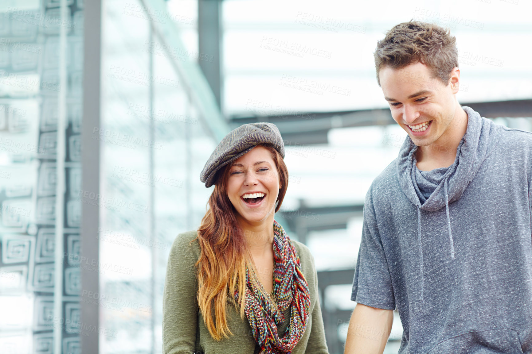 Buy stock photo Train station, walking and couple with love for laughing, funny memory and bonding together with joke. Happy people, man and woman in relationship for commitment, dating or travel for pubic transport