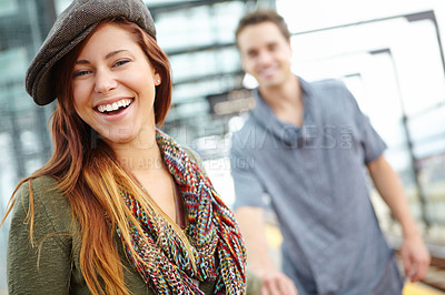 Buy stock photo Woman, portrait and travel at train station for holiday, vacation or London journey. Couple, holding hands and girl with love, romance and laugh at funny joke with transport and adventure or tourism