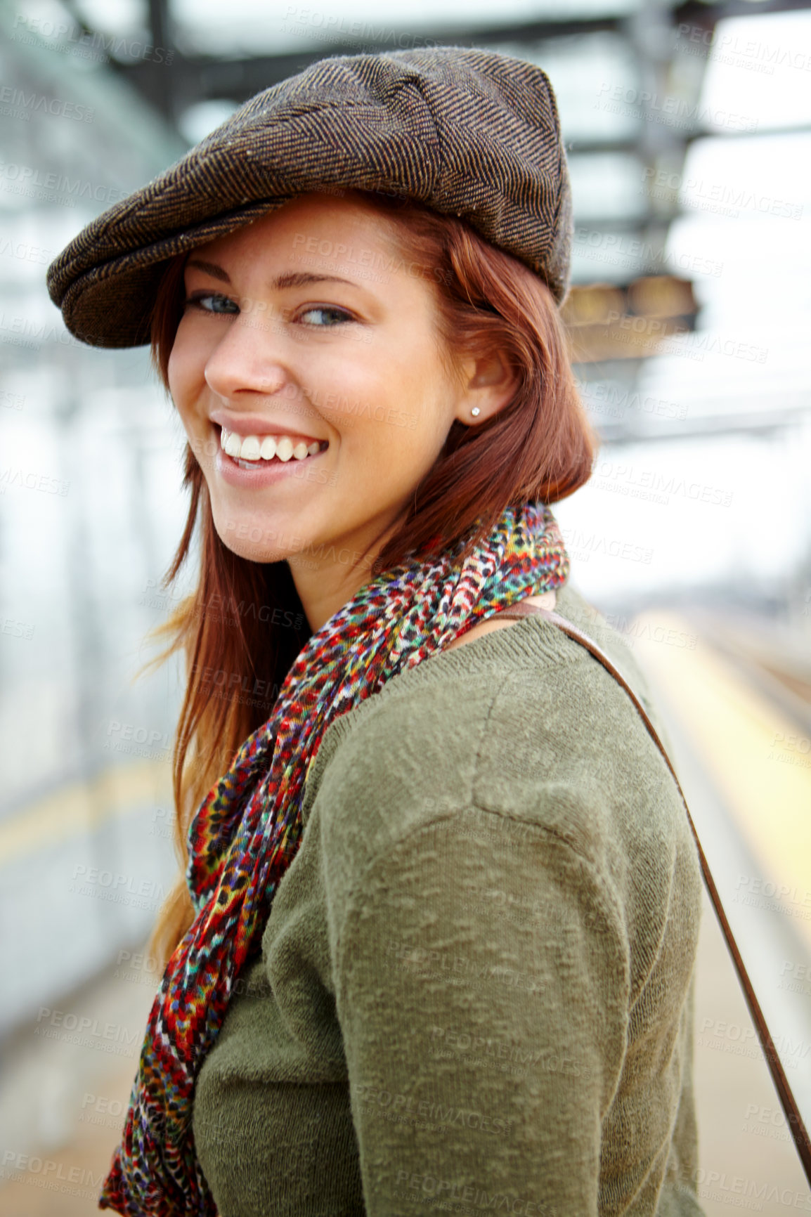 Buy stock photo Portrait, girl and railway for travel at train station with smile, subway and transport of morning journey. Happy, woman and relax on platform for waiting, commute and metro delay with departure trip