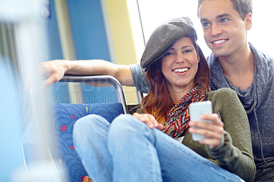 Buy stock photo Portrait of a pretty girl and her boyfriend on a train  