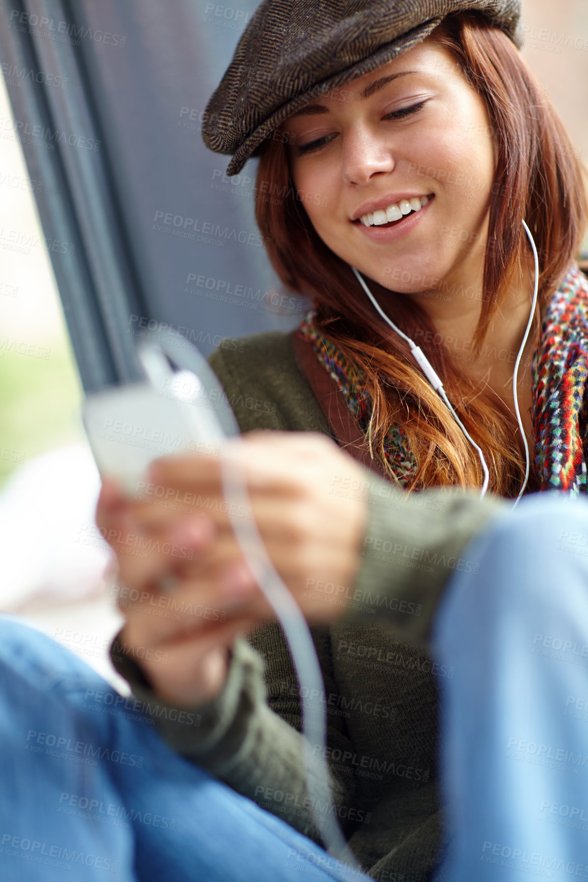 Buy stock photo Typing, smile and woman with cellphone, listening to music and contact with connection, app and joy. Person, social media and girl with smartphone, sound and audio with podcast, mobile user and relax