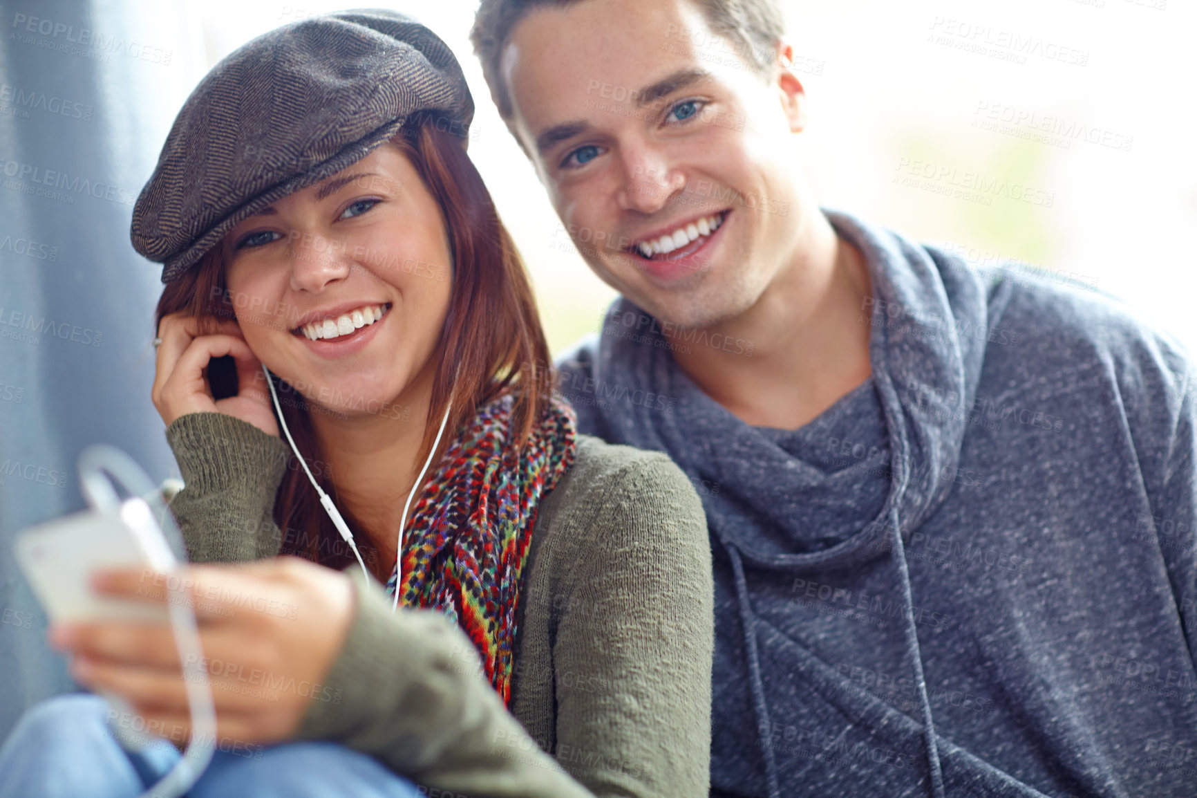 Buy stock photo Travel, music and portrait with couple at bus station. for holiday, streaming and journey together. Audio, public transportation and podcast with people at subway for support, adventure and date