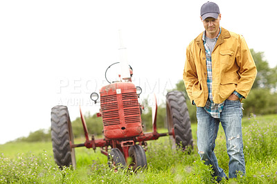 Buy stock photo Farmer, worker and tractor for work in countryside for sustainable business. Farm, man and agriculture for eco friendly and harvest of crops in field with machine and vehicle for plant cultivation