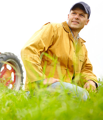 Buy stock photo Tractor, thinking and man on farm in nature for harvesting plants, growth and vegetable crops. Agriculture, transport and farmer by vehicle for sustainability, agro business or produce in countryside