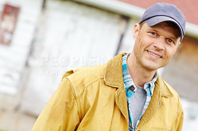 Buy stock photo Portrait of casually dressed man smiling while standing outside