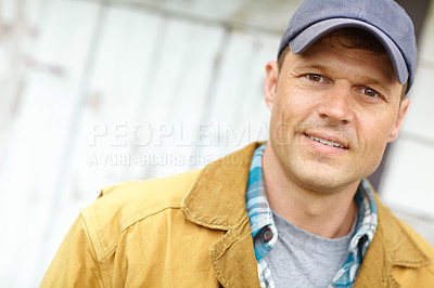 Buy stock photo Portrait of a smiling man with a cap on