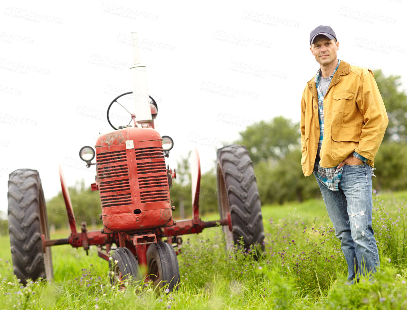 Buy stock photo Tractor, farm and outdoor portrait of man with confidence, agro industry or small business owner at harvest. Agriculture, sustainability and farmer in field with pride, smile and truck in countryside