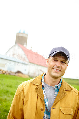 Buy stock photo Man, farming and happy in portrait on field, pride or food production for sustainability in countryside. Person, farmer and small business owner for smile in morning, nature or agro industry in Spain