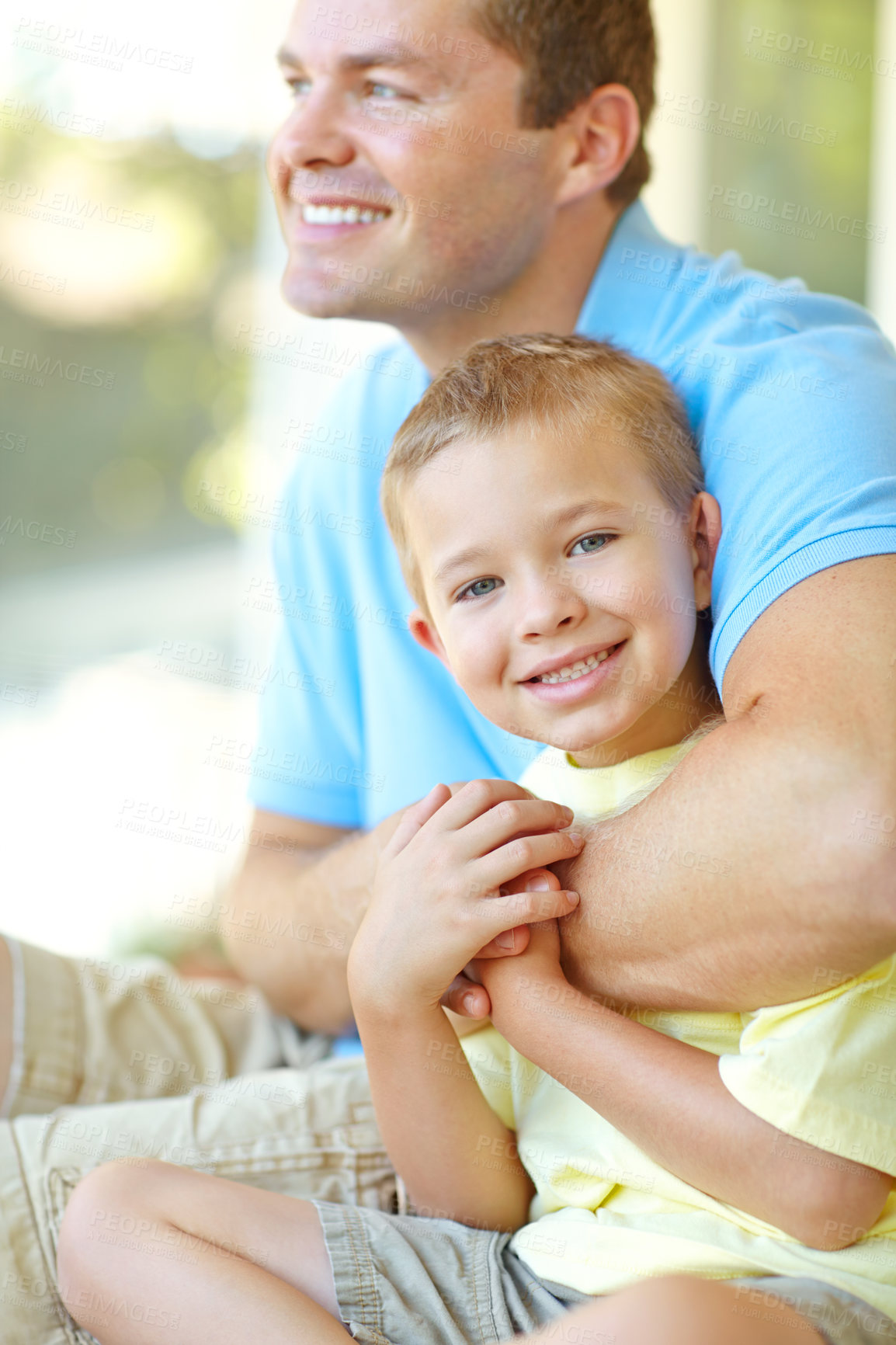 Buy stock photo Father, child and relax with hug at house for safety, parental support and bonding together of weekend break. Smile, man and son with embrace for family love, proud relationship and calm morning